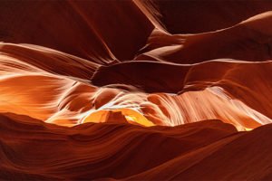 Undo App | Red rocks with sunlight coming through, capturing a mindful moment in nature.