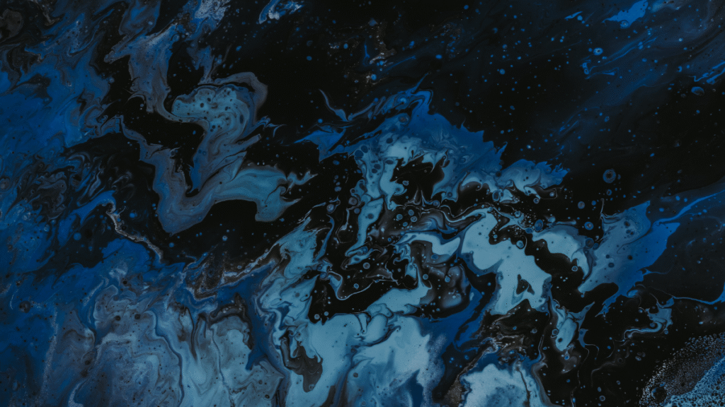 Feeling disconnected from your body and mind. Dark blue sea waves.