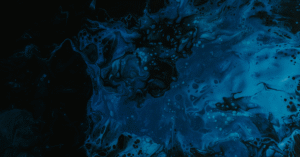 Feeling disconnected from your body and mind. Dark blue sea waves.